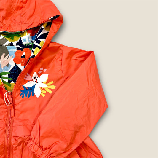 Chubasquero reversible coral con flores Peques del Valle