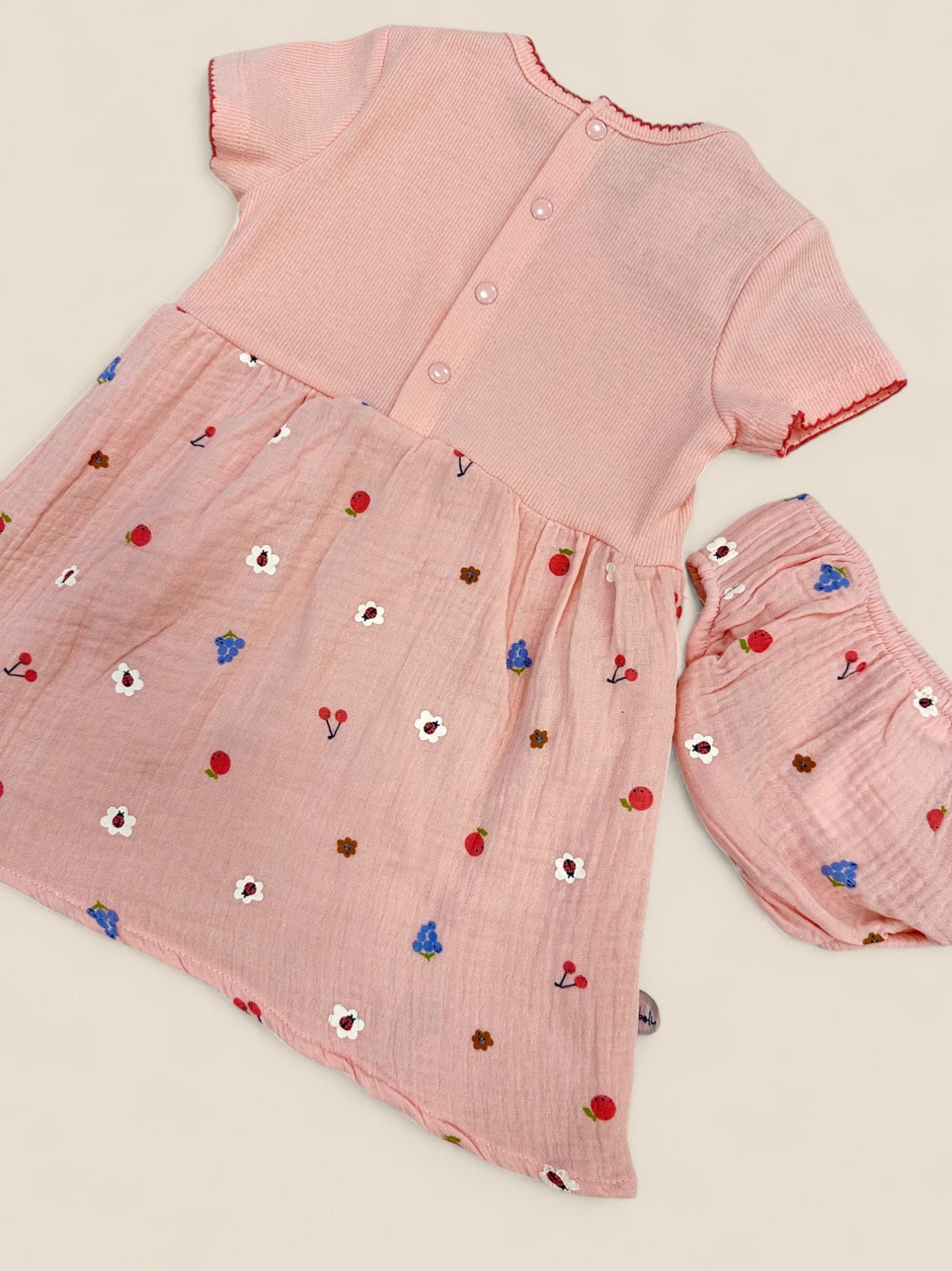 Vestido rosa manga corta detalle de flores Peques del Valle