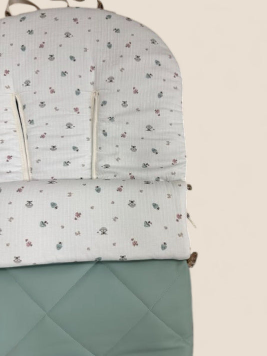 Saco de polipiel verde agua con muselina estampada de setas y caracoles Peques del Valle