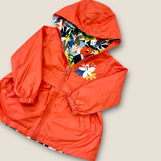 Chubasquero reversible coral con flores Peques del Valle