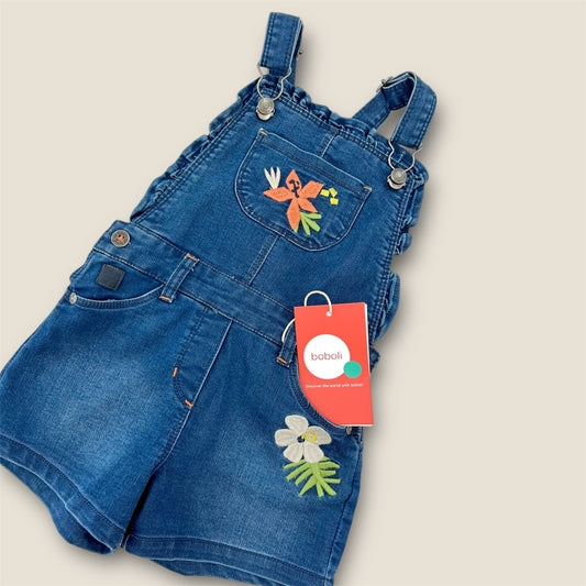 Peto denim con flores.