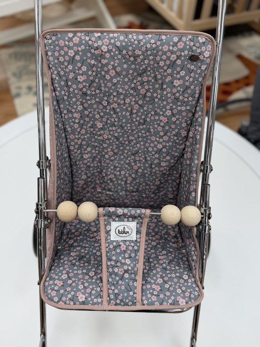 Carrito Bebelux de muñecas flores rosa vintage con bolsito a juego Bebelux