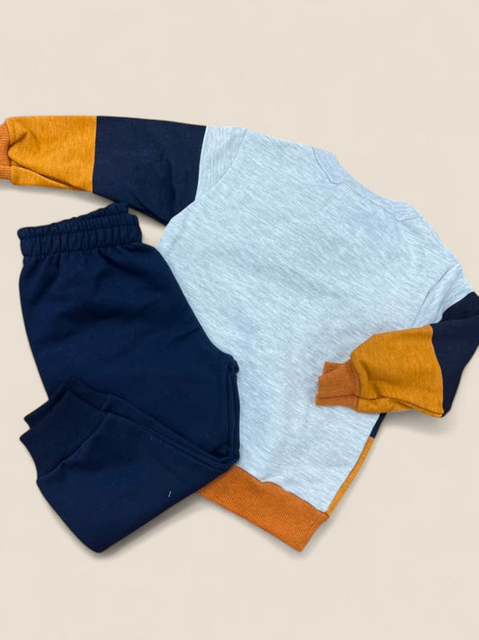 Conjunto dinosaurios niño en tonos azul y mostaza KYLY