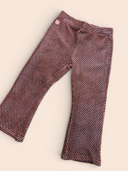 Leggings naranja con estampado de corazones