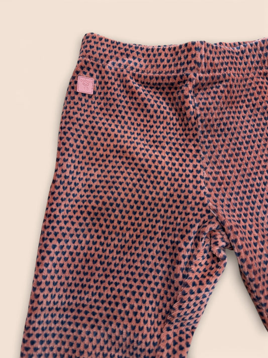 Leggings naranja con estampado de corazones