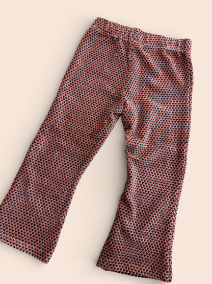 Leggings naranja con estampado de corazones