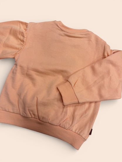 Sudadera infantil color teja con flores en relieve y manga abullonada
